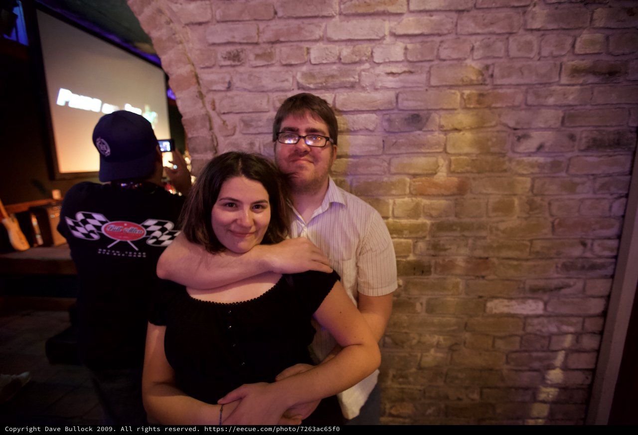 Couple Embracing at Austin Bar Karaoke Night
