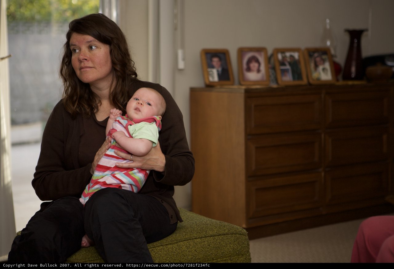 Mother and Newborn in Quiet Domestic Moment