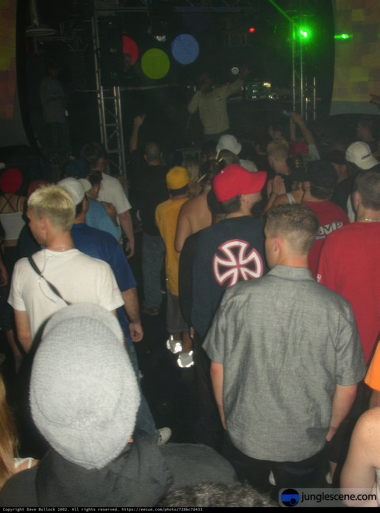Nightclub Party with Baseball Hat Man