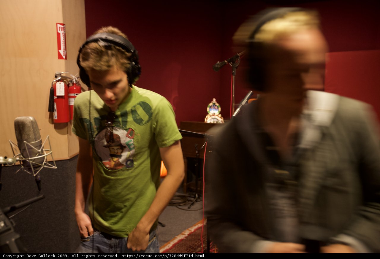 Green-Shirted Musician in Studio