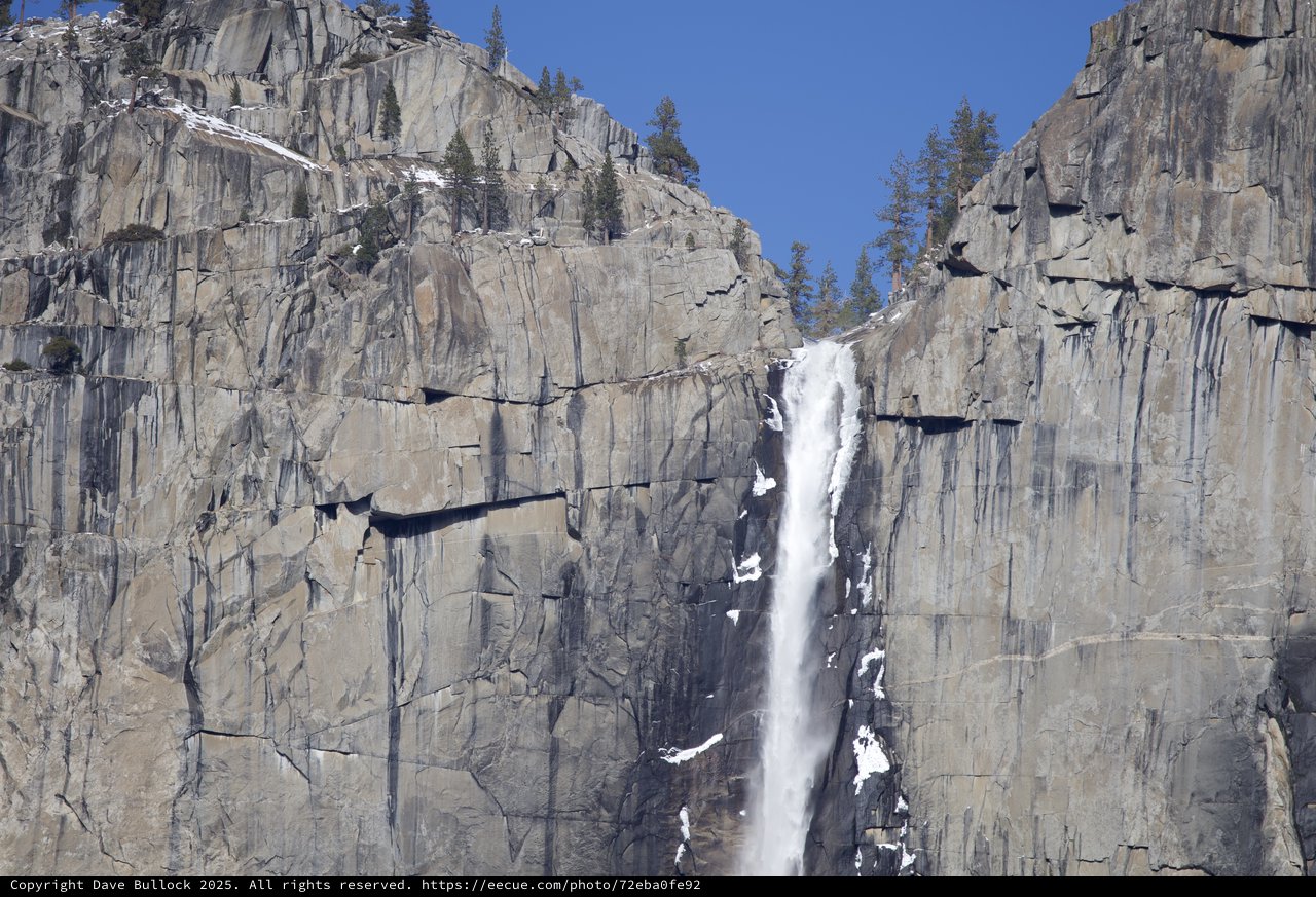 Yosemite Falls Cascading Between Towering Granite Cliffs
