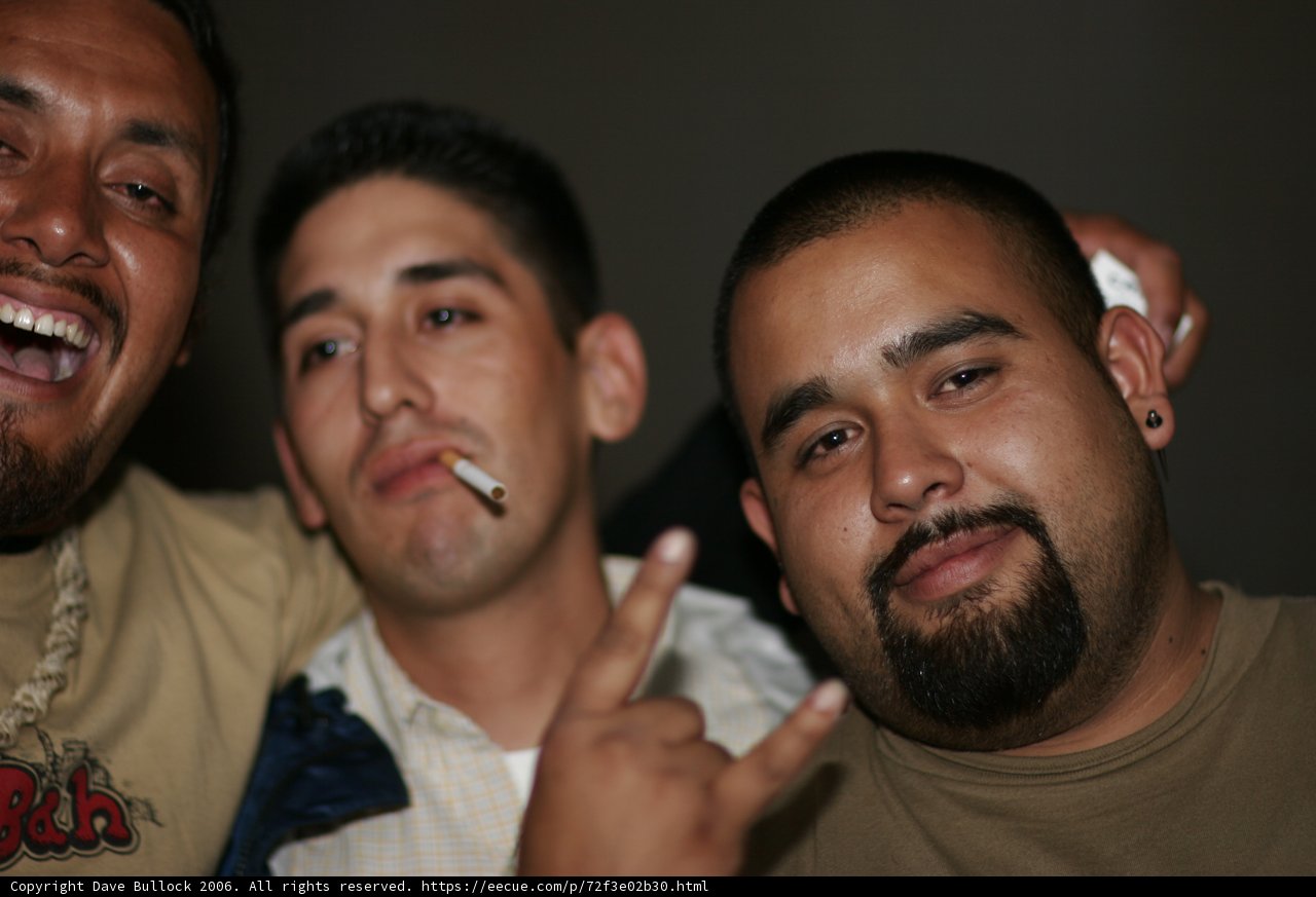 Three Men Strike a Pose