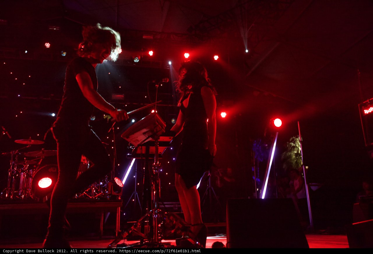 Rocking the Stage under the Red Spotlight