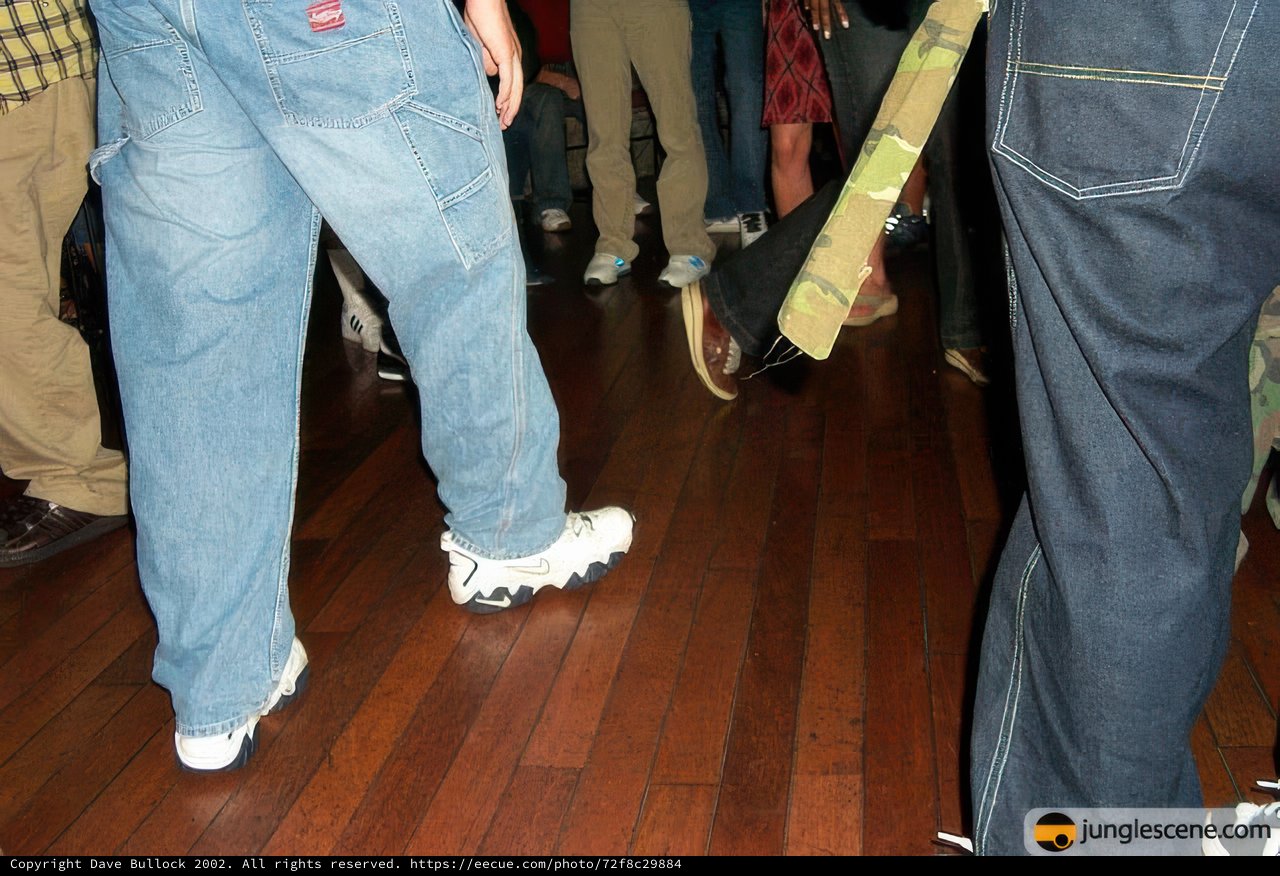 Blue Jeans on Hardwood Floor