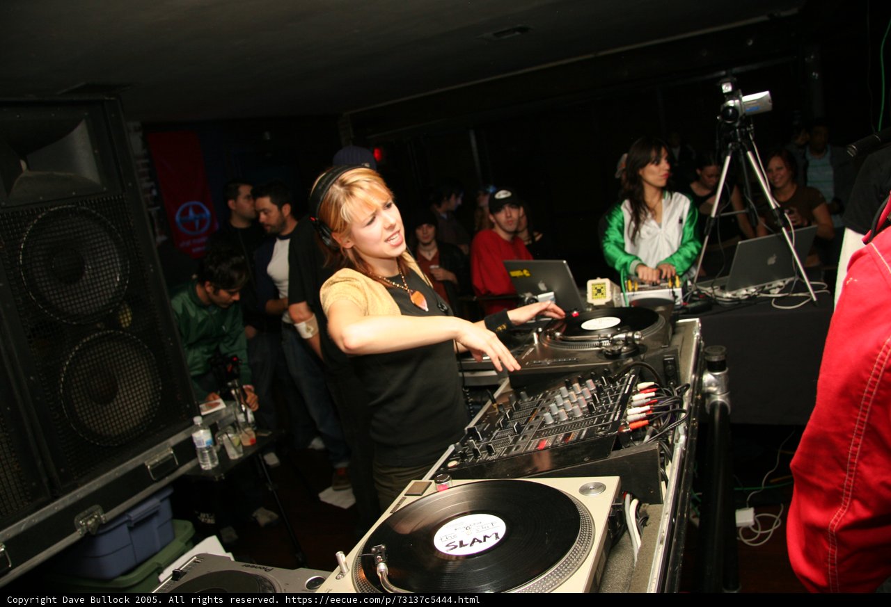 DJ Reid Speed mixing beats at a nightclub