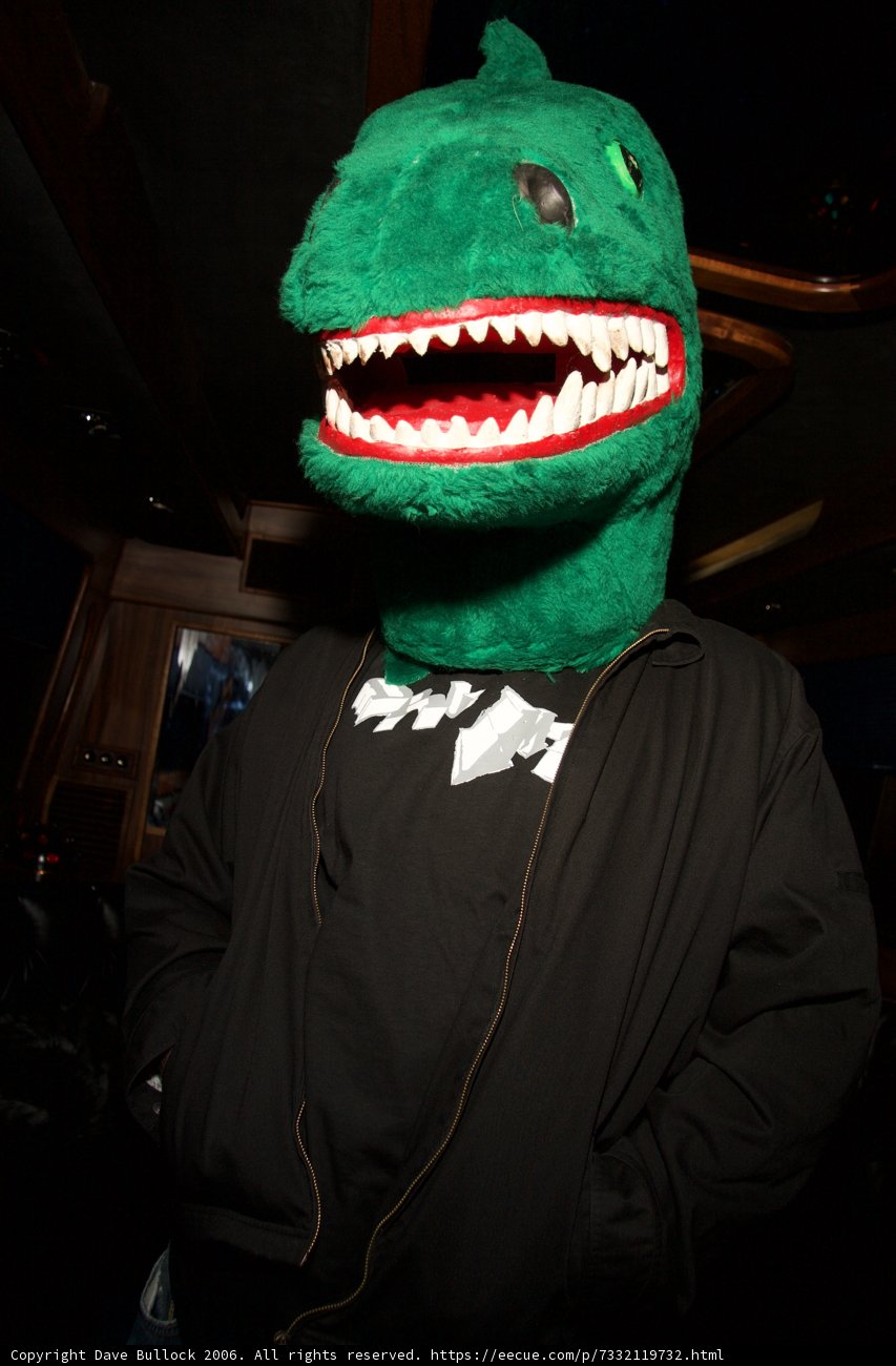 Green Dinosaur Head Man