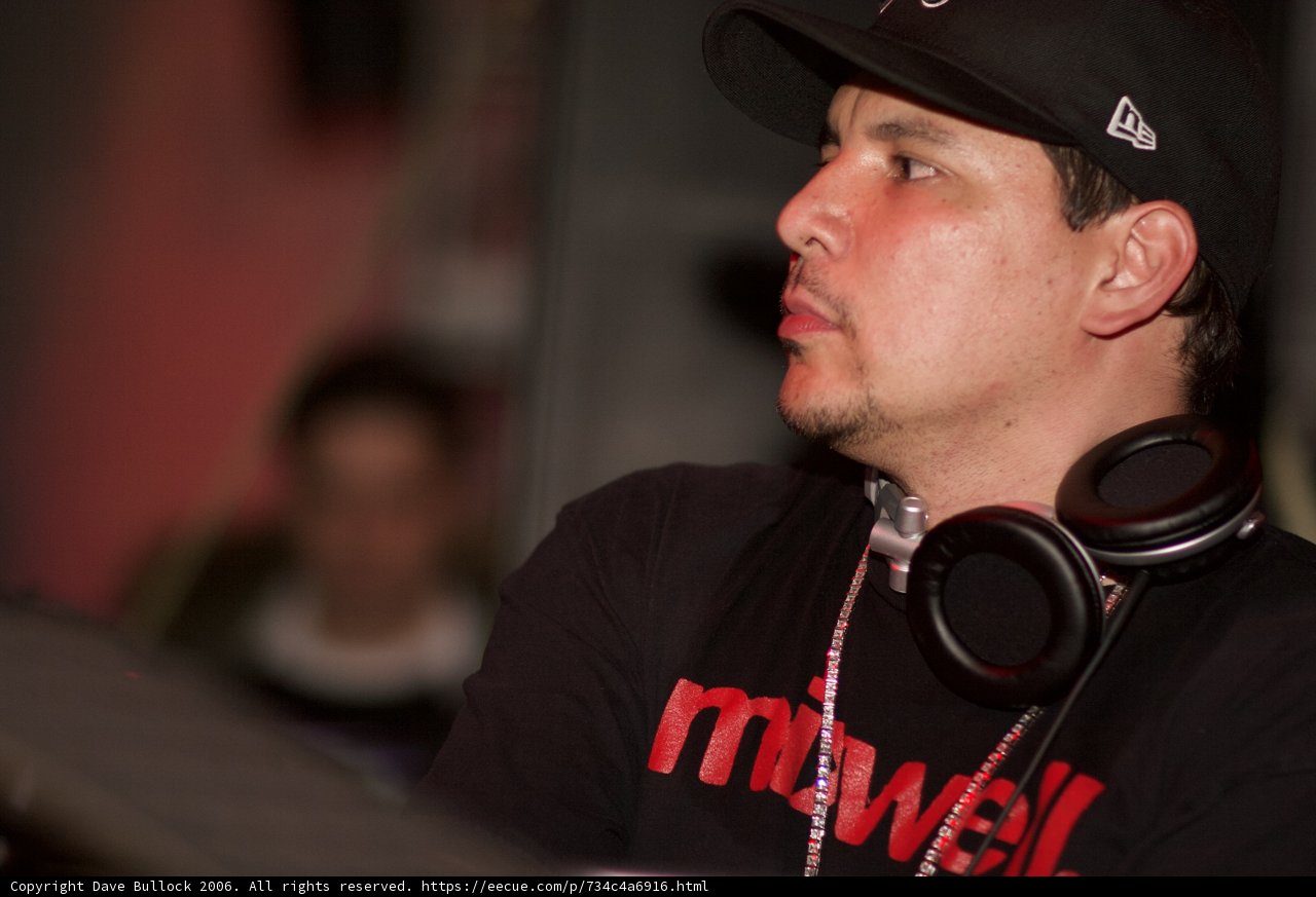 Partygoer Rocks Baseball Cap and Headphones