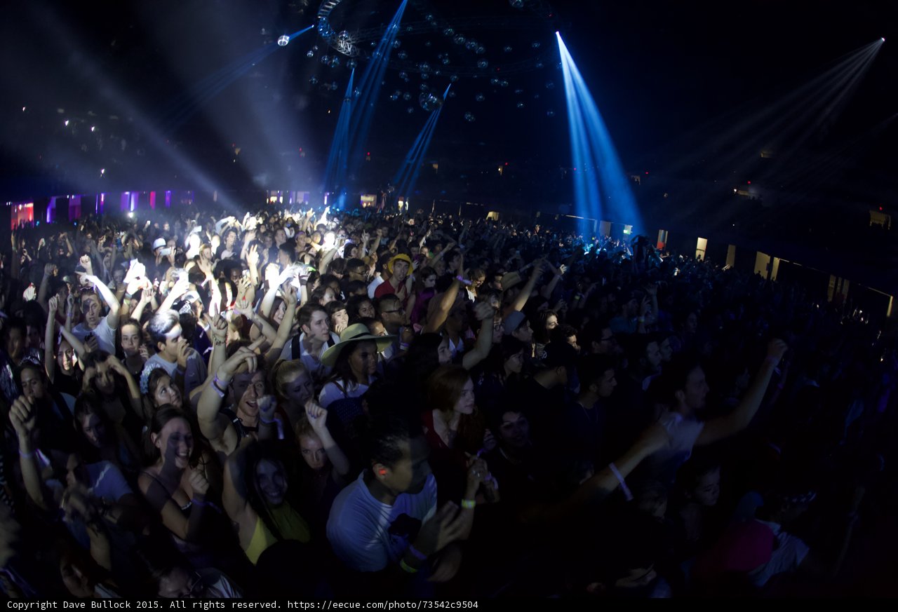 Crowd Under Blue Beams