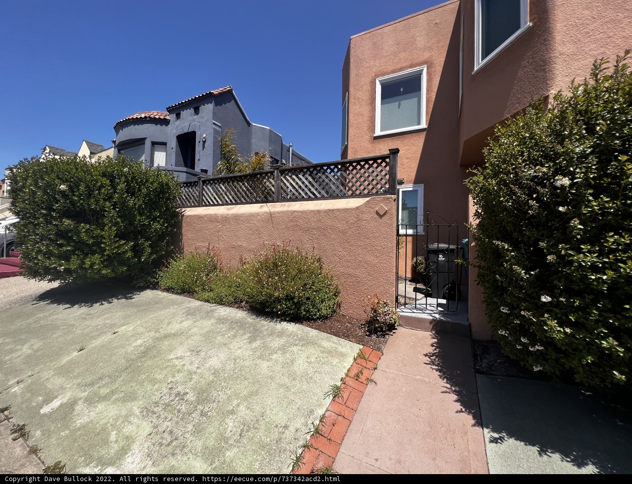 Charming Suburban Home with Ivy Fence