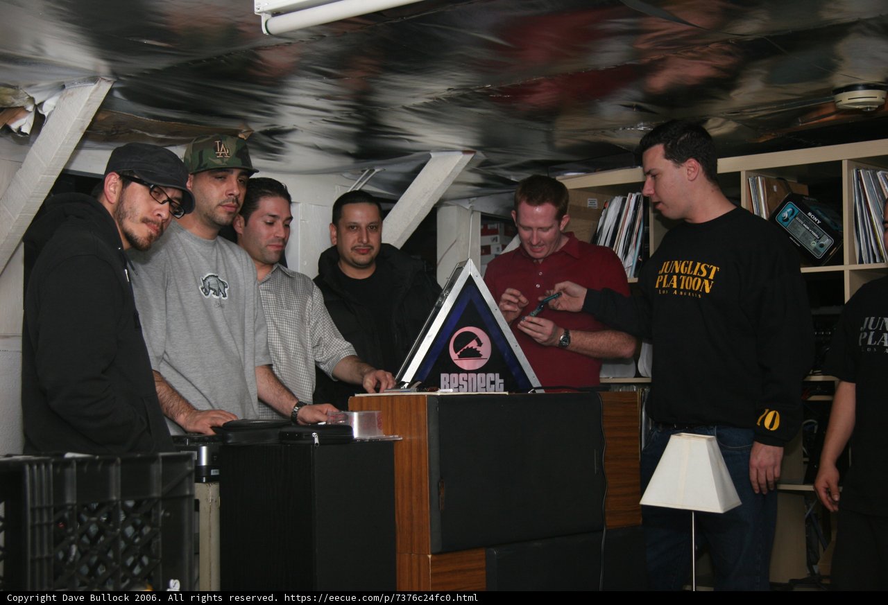 Men Gather Around Table for Business Discussion