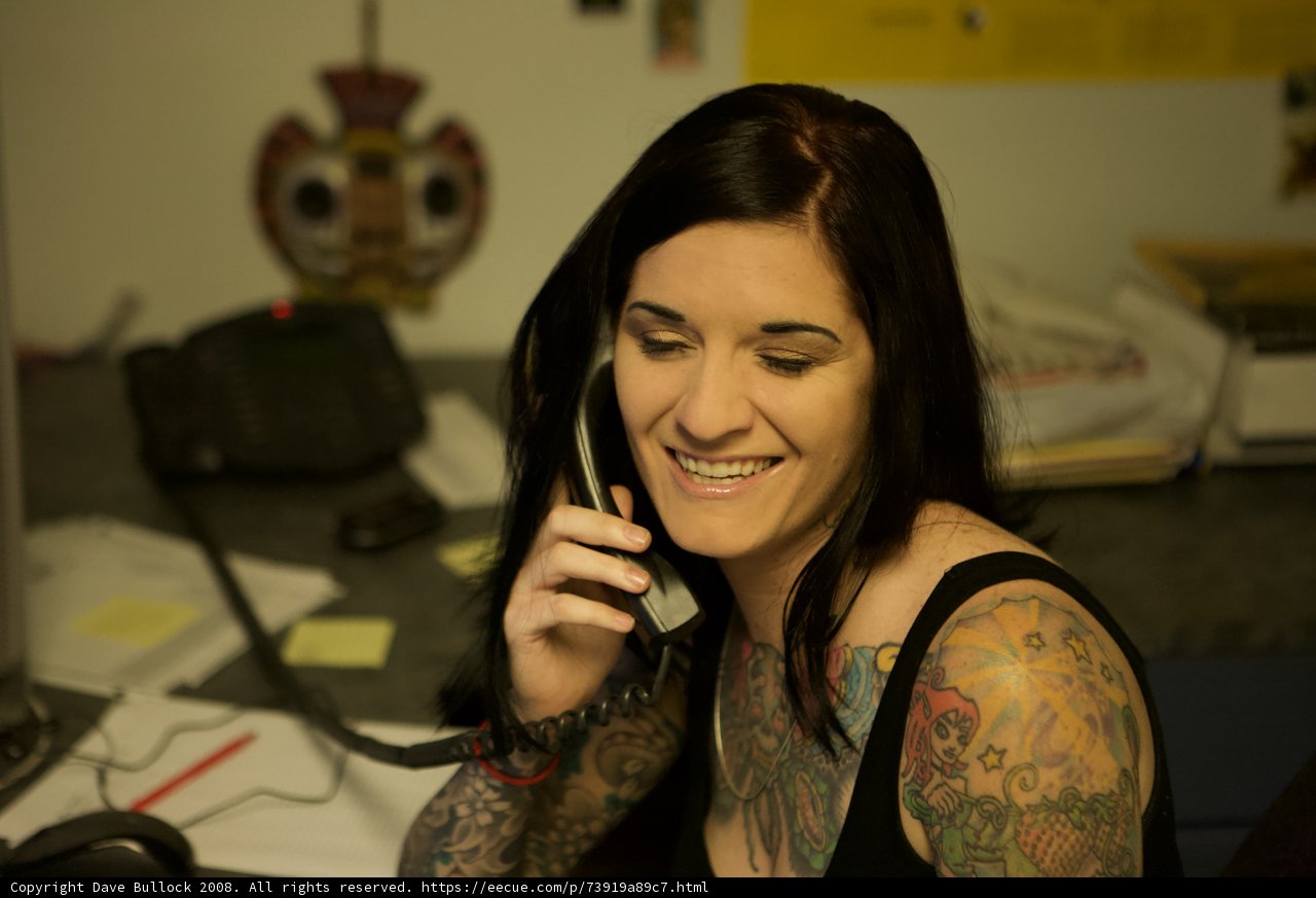 Tattooed Woman on the Phone