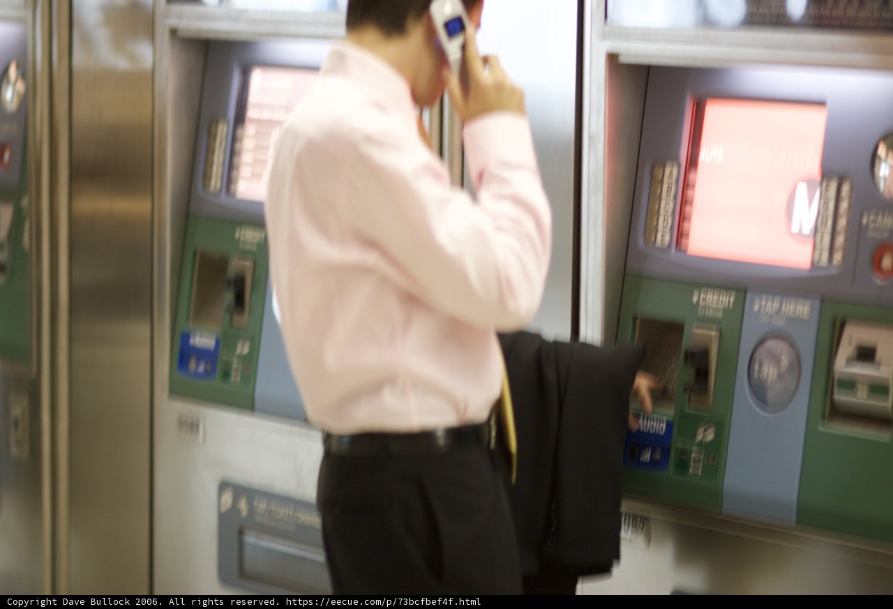 Man beside a complex machine