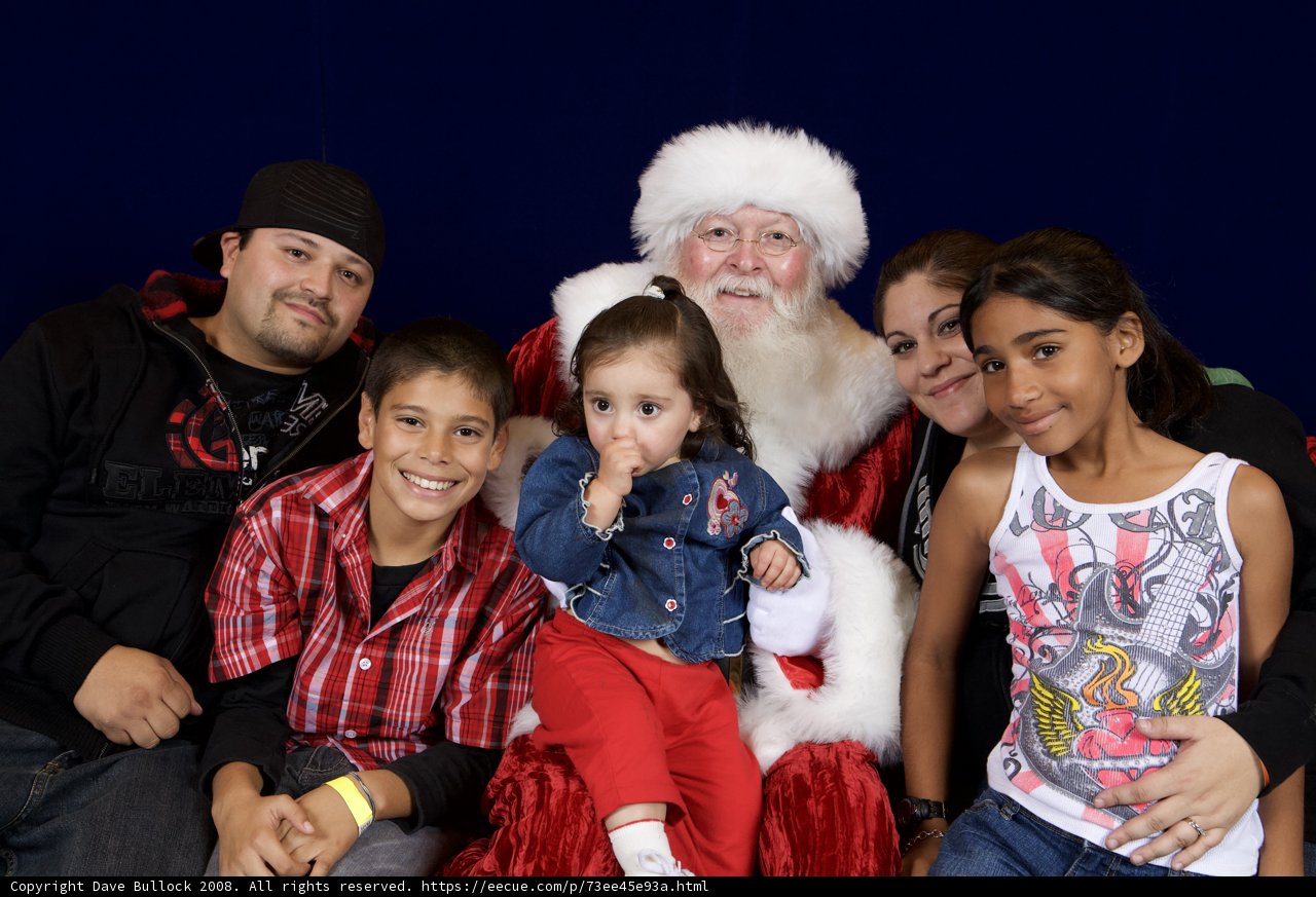 Smiling Faces and Santa Claus at APC Christmas Party