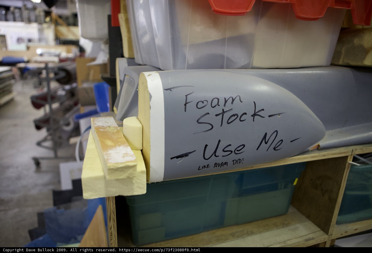 A Wood Shelf with Foam and Other Items
