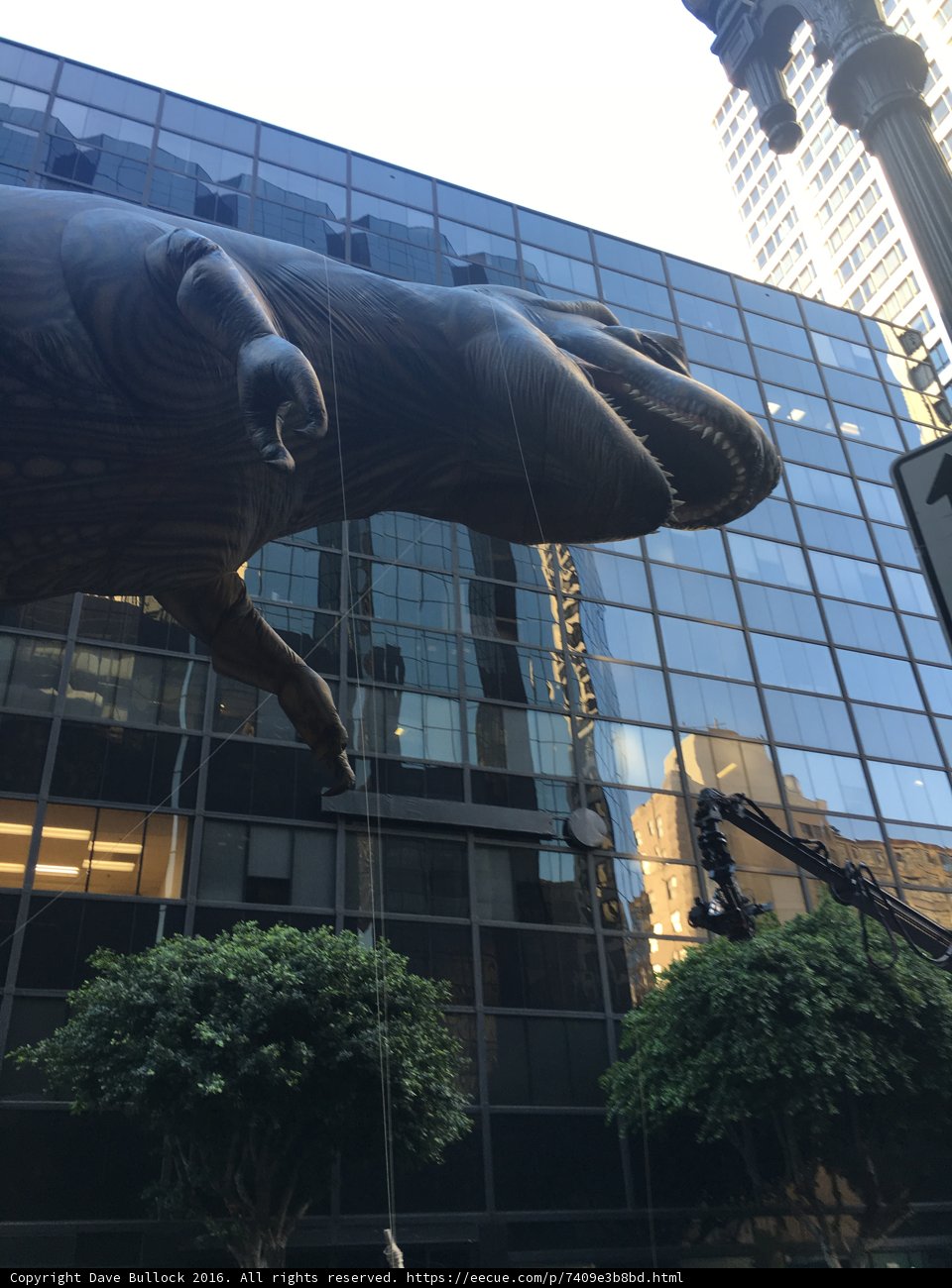 The Majestic Dinosaur Statue in Front of the Metropolis Office Building