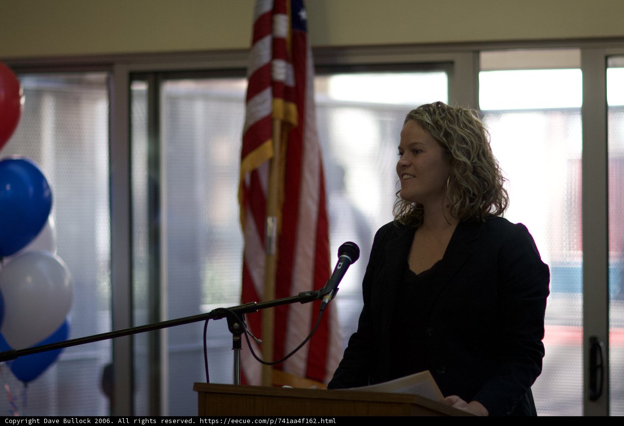 Woman addressing the crowd with patriotic fervor