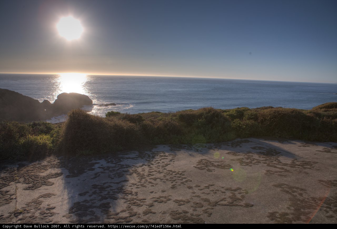 Cliffside View of a Glowing Ocean