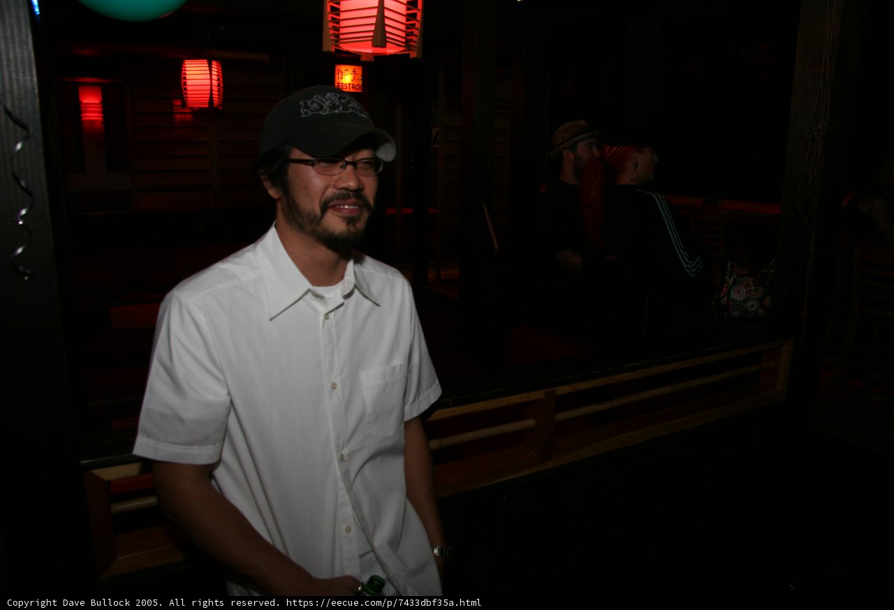 White Shirted Man in Urban Setting