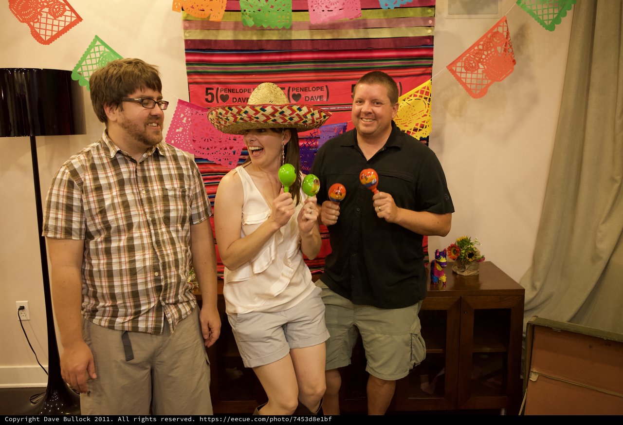 Friends Celebrate with Maracas at Fiesta Anniversary Party
