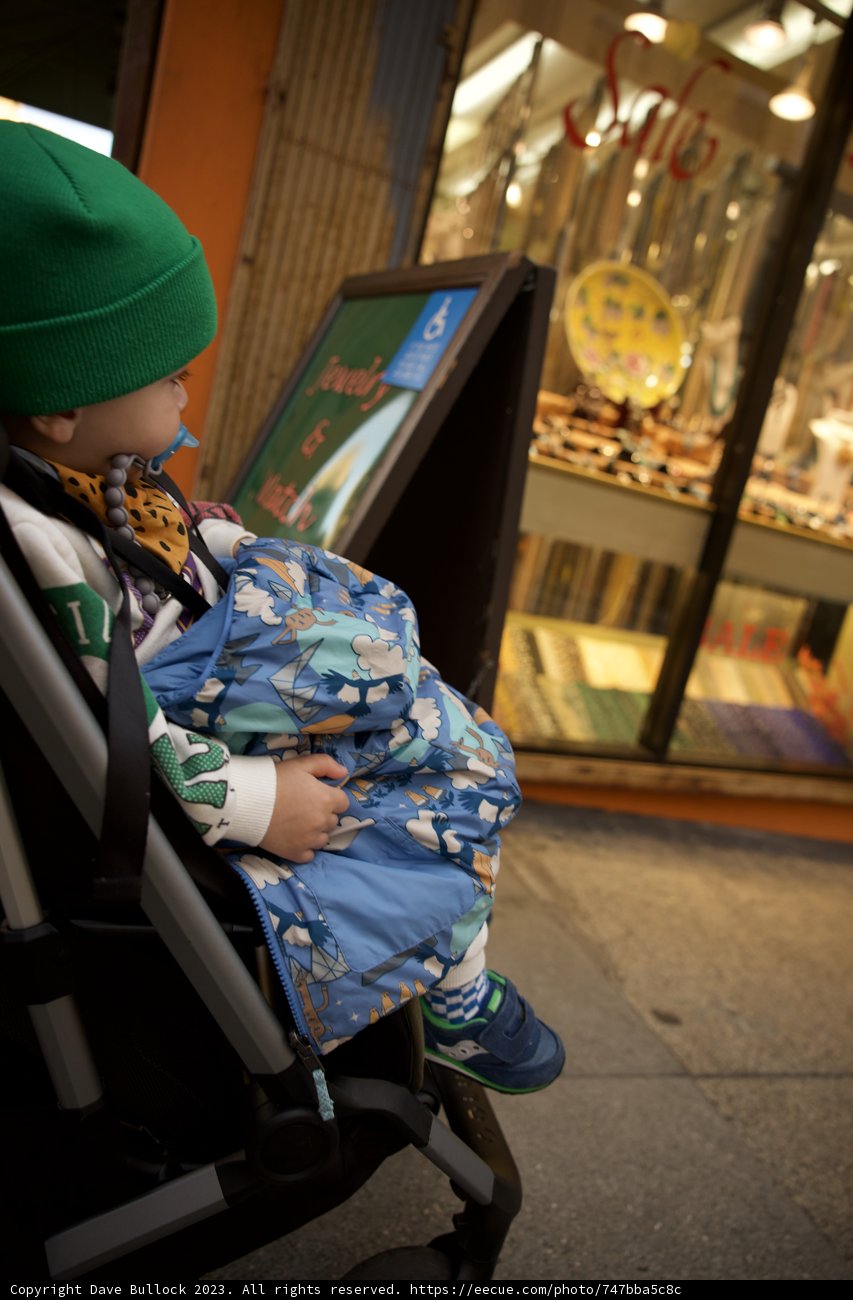 Beanie-Clad Boy in Chinatown