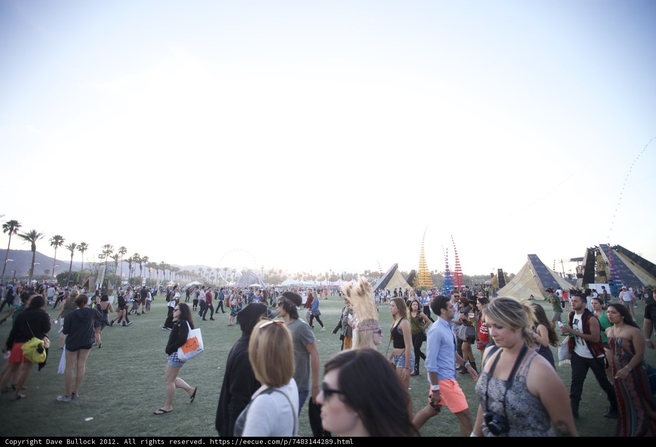 Festival-goers roam free on the grassy fields