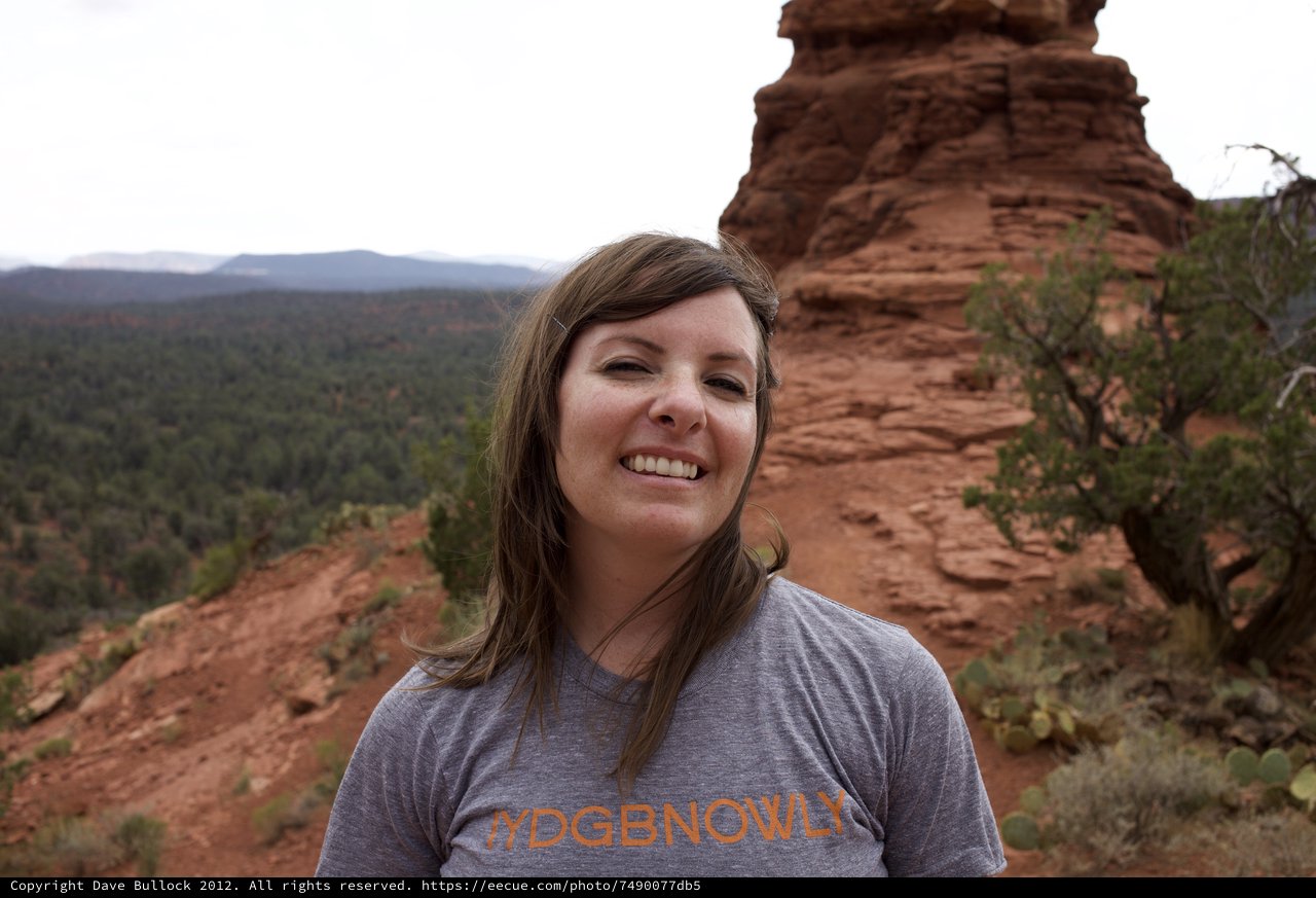 Smiling Hiker Atop Sedona Red Rock Formation