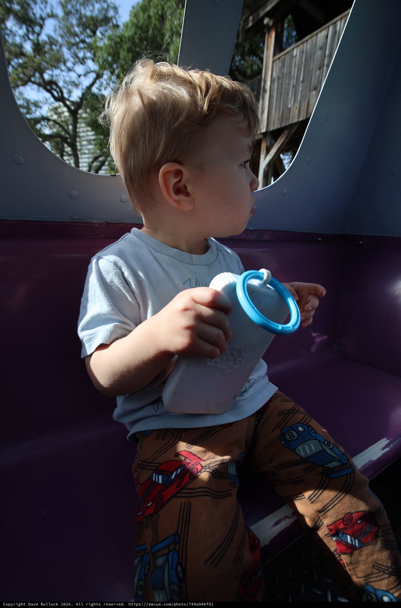 Toddler with Sippy Cup at Playground