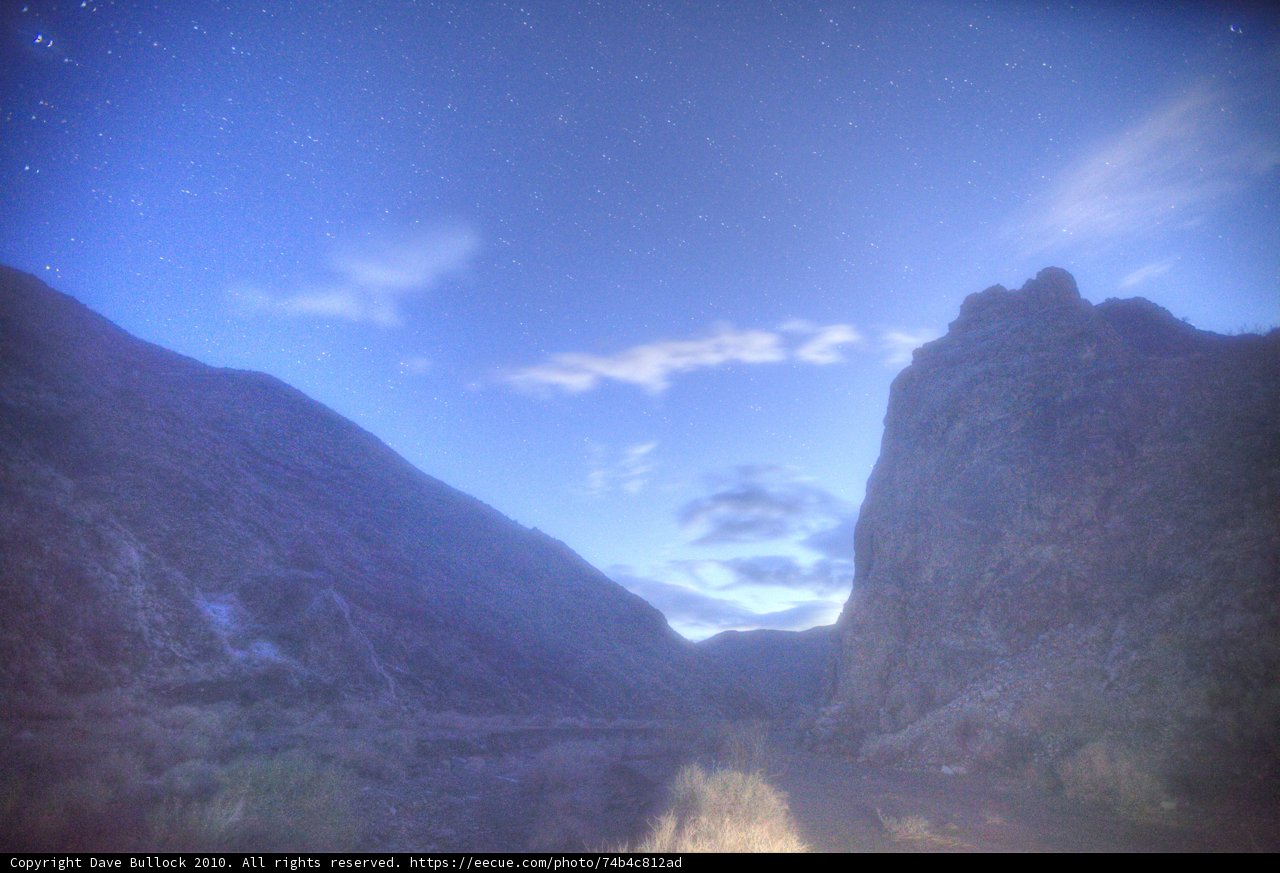 Majestic Mountain Range with Starry Night Sky