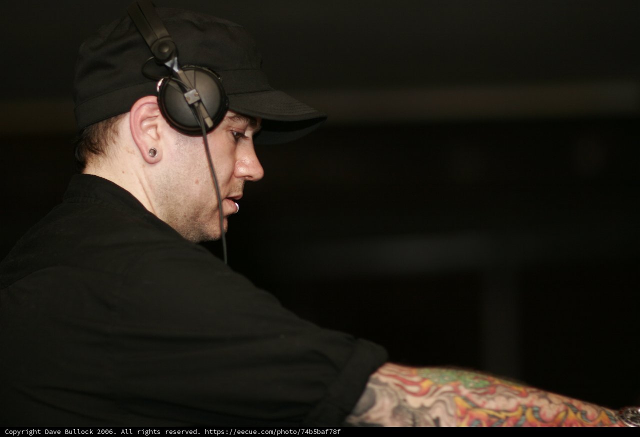 Tattooed Man with Headphones