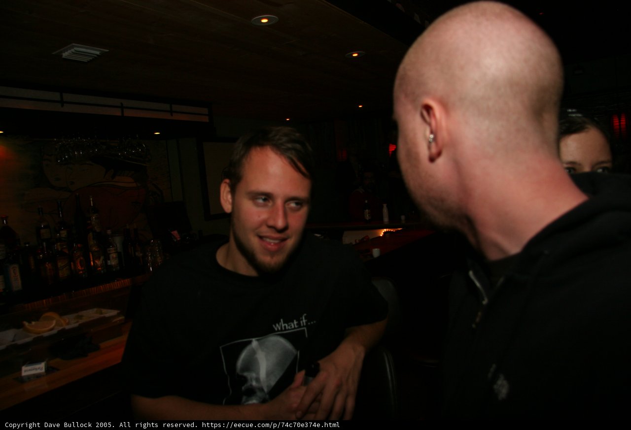 Two Men Enjoying a Night Out at the Pub