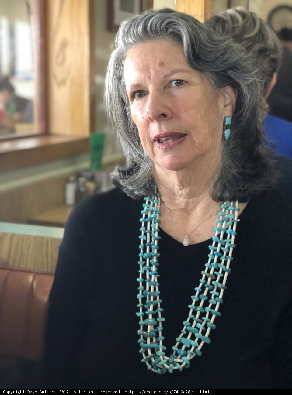 Turquoise beads add pop of color to woman's accessory collection