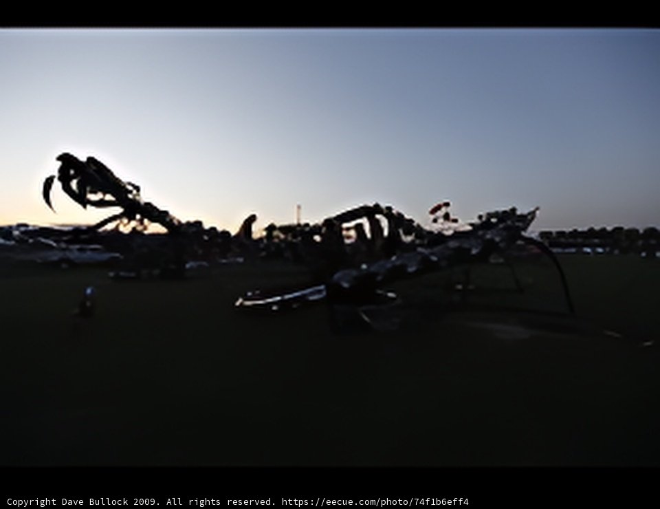 Massive Metal Sculpture in a Serene Field