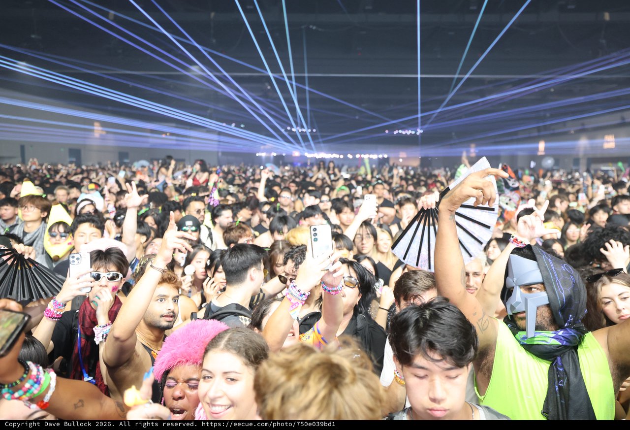 Massive EDM Crowd Erupts Under Laser Light Show