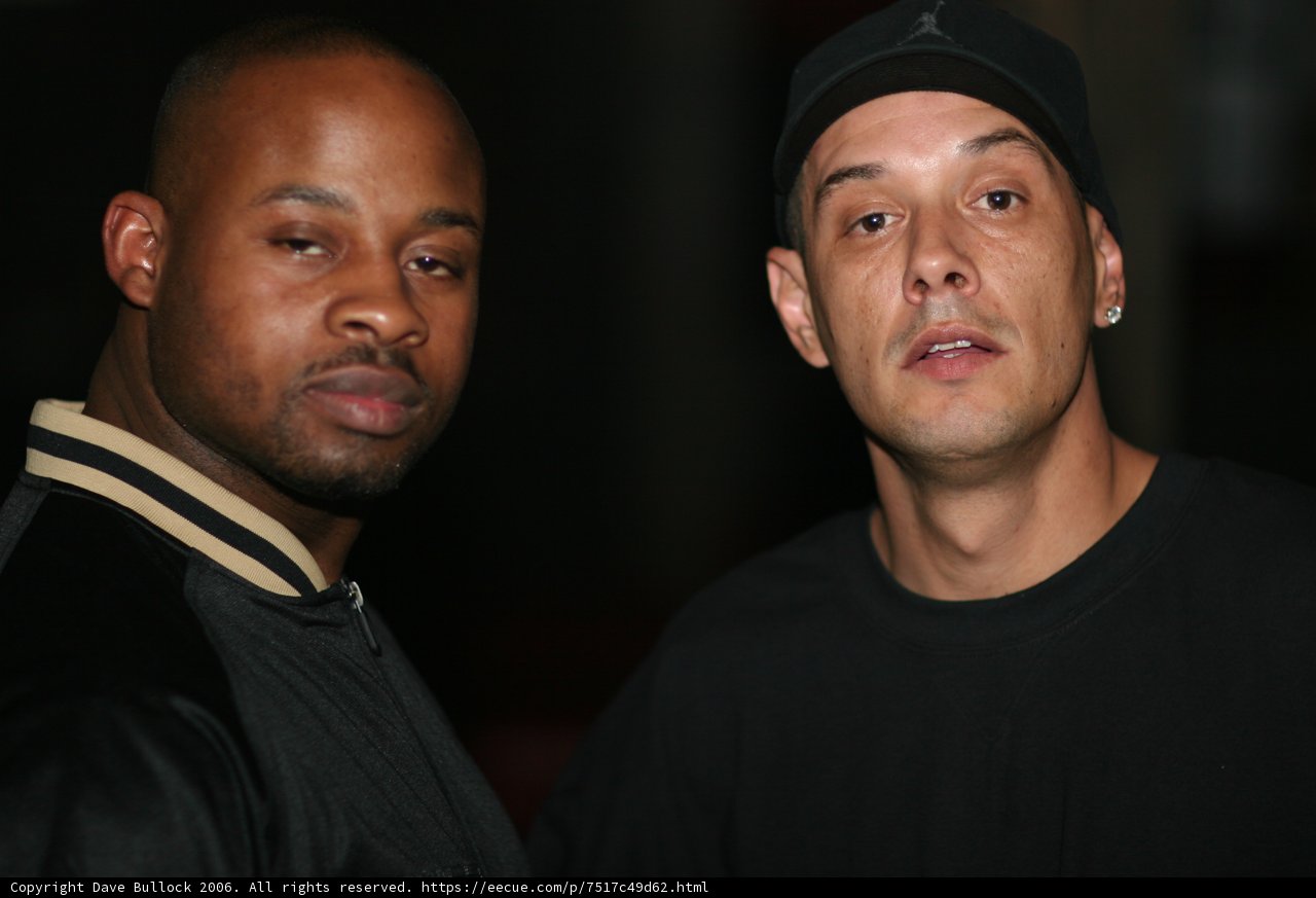Two Men in Jackets and Caps