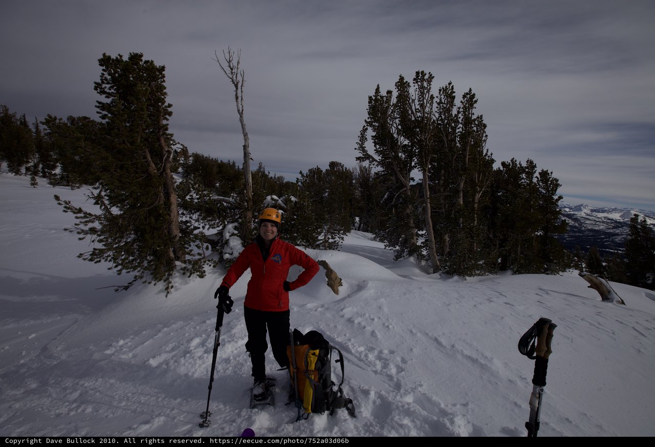 Winter Mountaineer Smiling on Snowy Sierra Summit