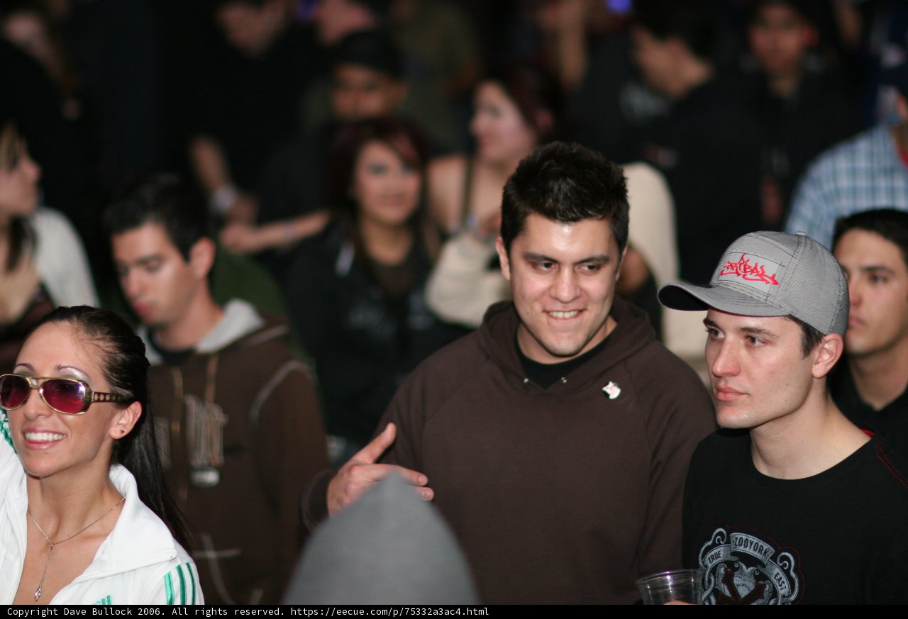 Brown Hoodie in the Urban Crowd