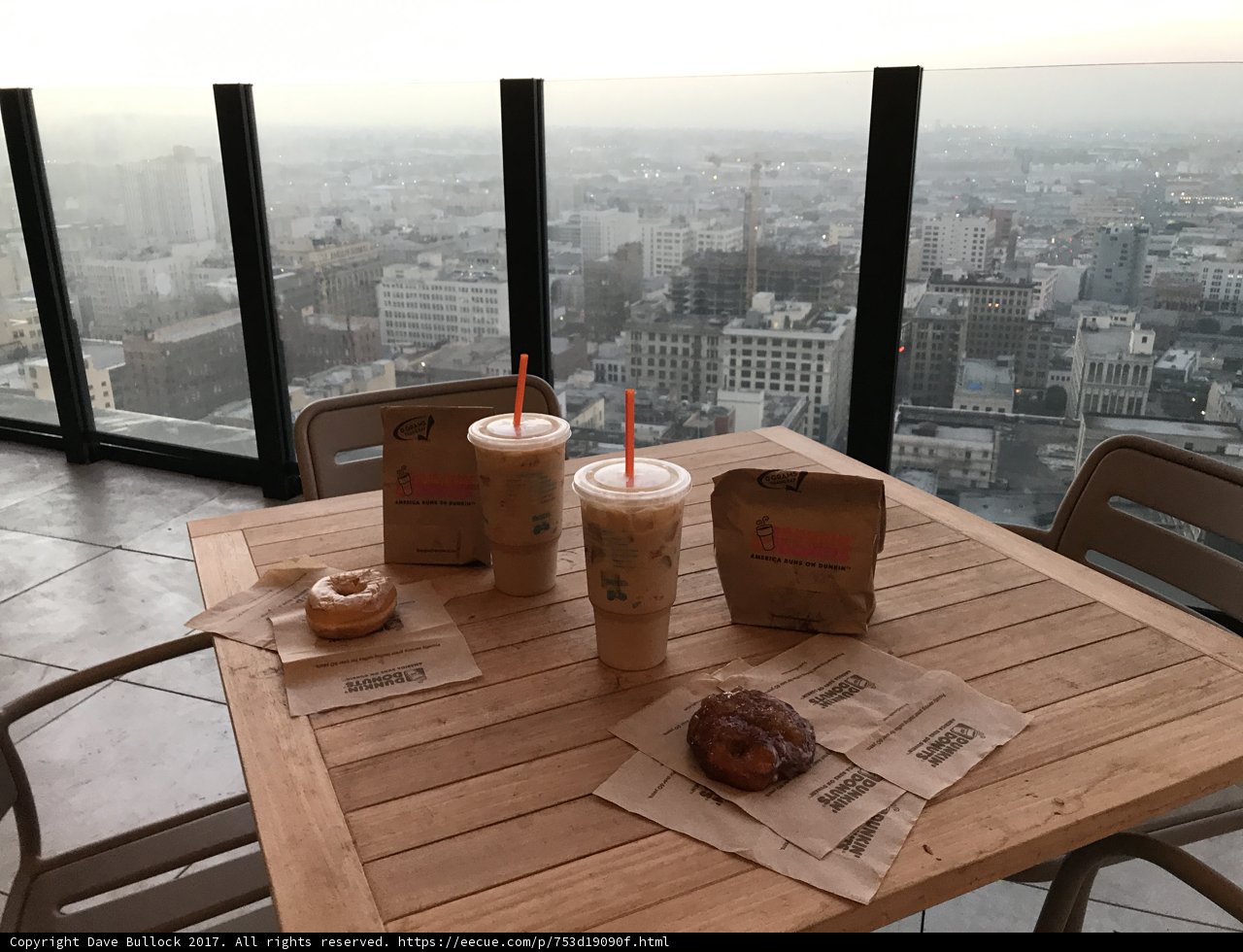 Coffee and Donut on Wooden Table