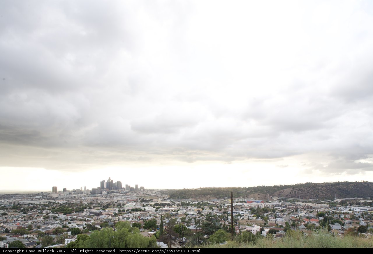 Cityscape Skyline Amidst the Clouds
