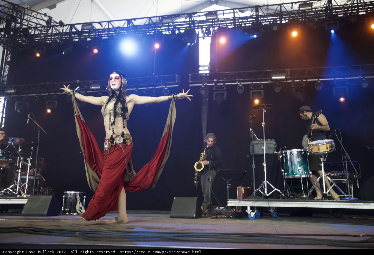 Tairrie B Lights Up the Stage in a Red Dress