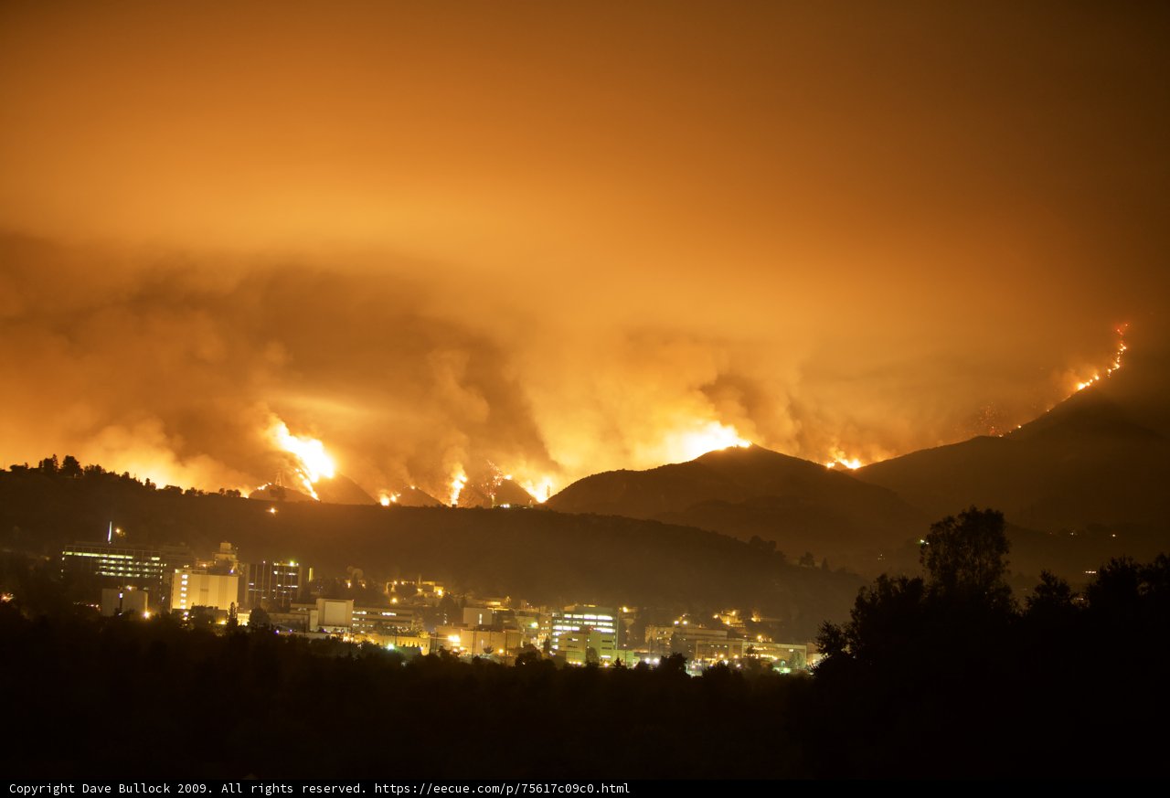 Station Fire Rages in the Hills Above the Cityscape