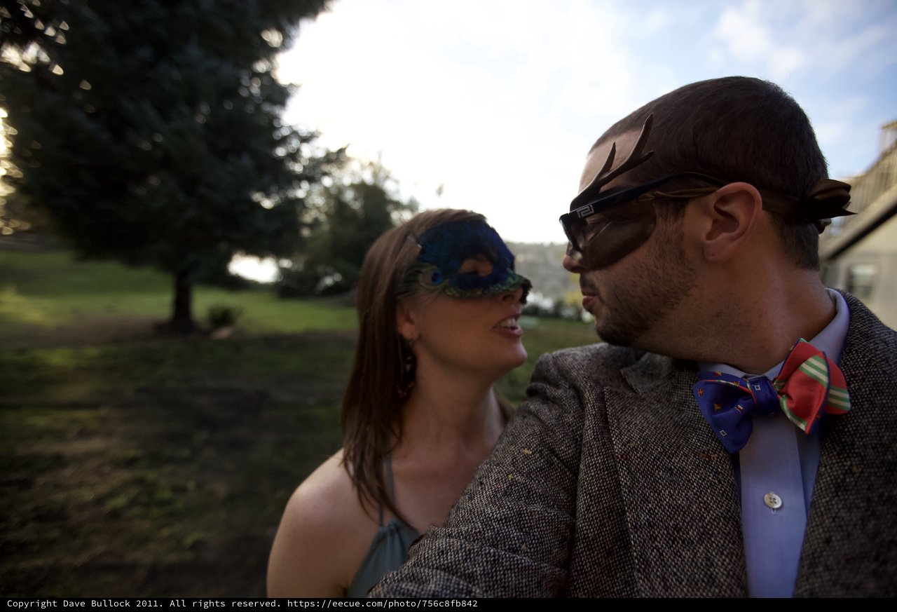 Masquerade Couple at Autumn Wedding Celebration