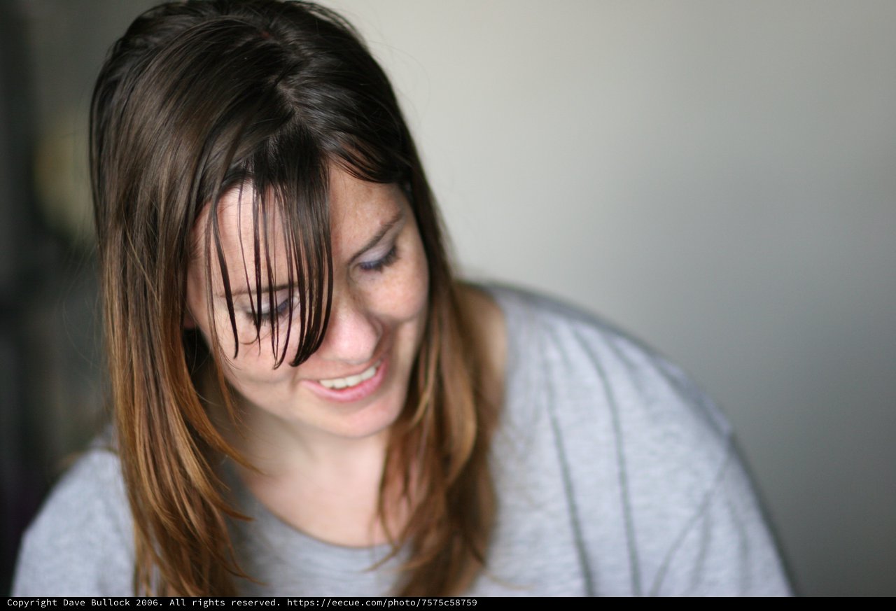 Candid Smile with Wet Hair Falling Forward