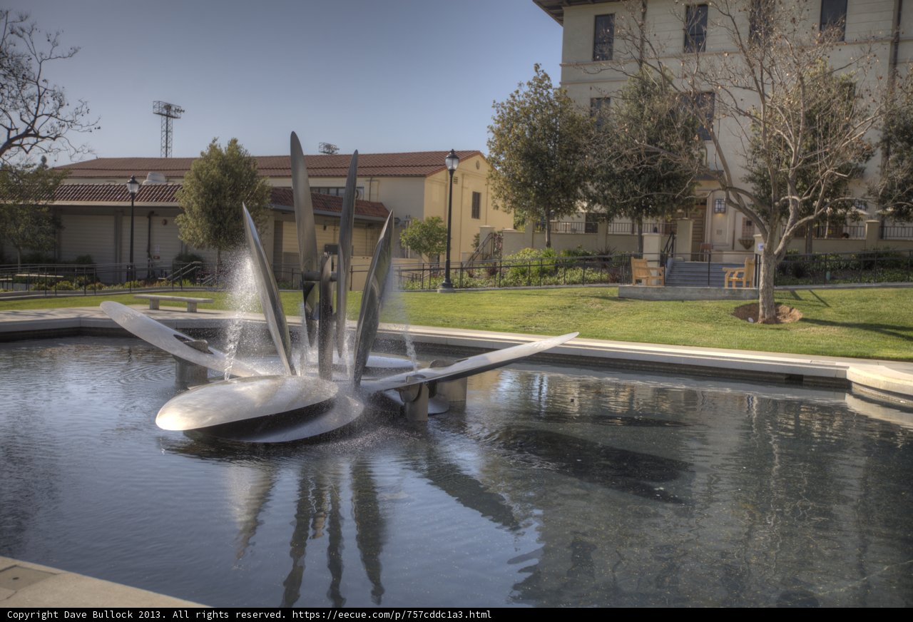 Serene Fountain with Cityscape
