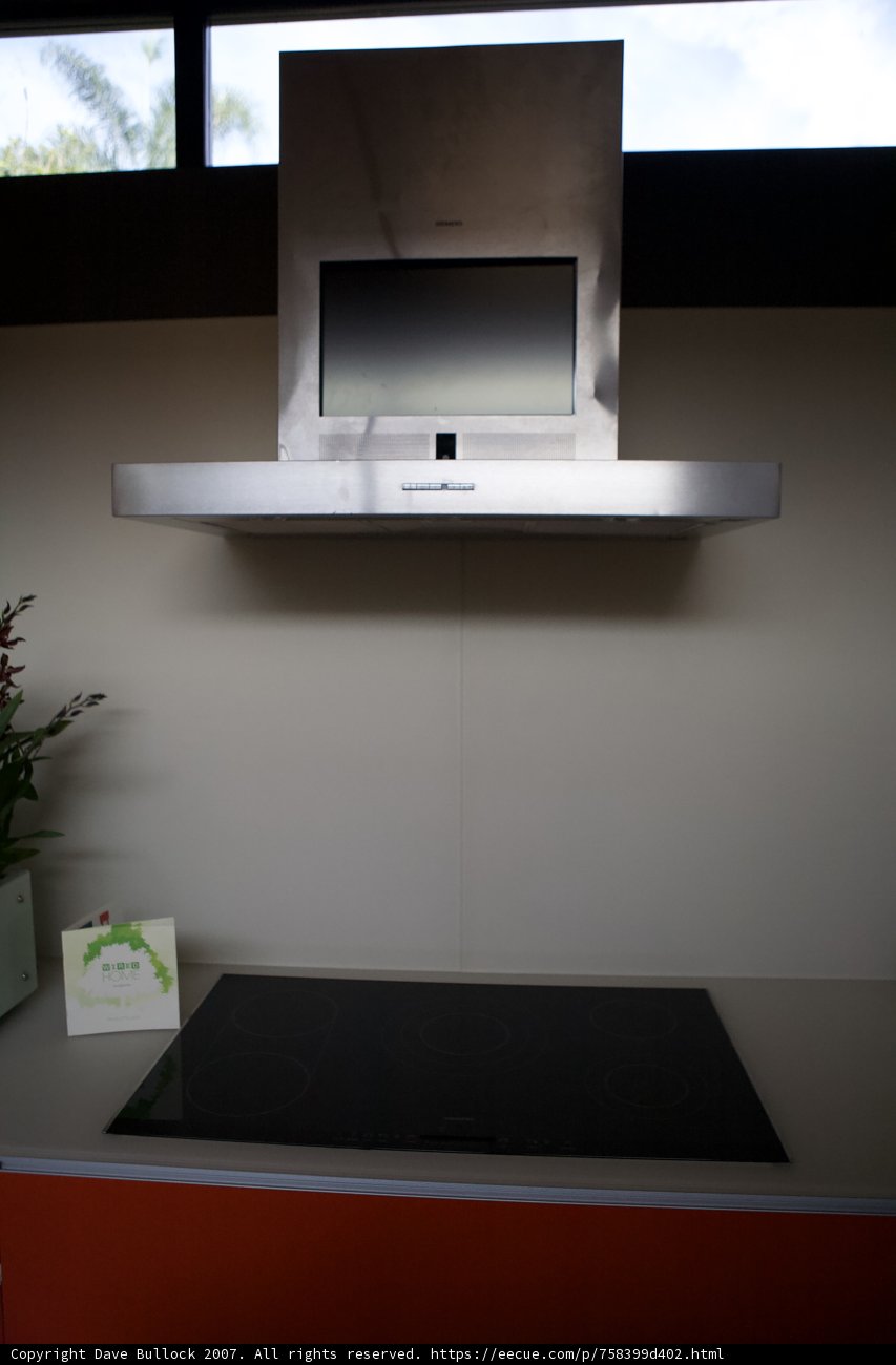 Modern Kitchen with Stylish Electronics and Decorative Plants