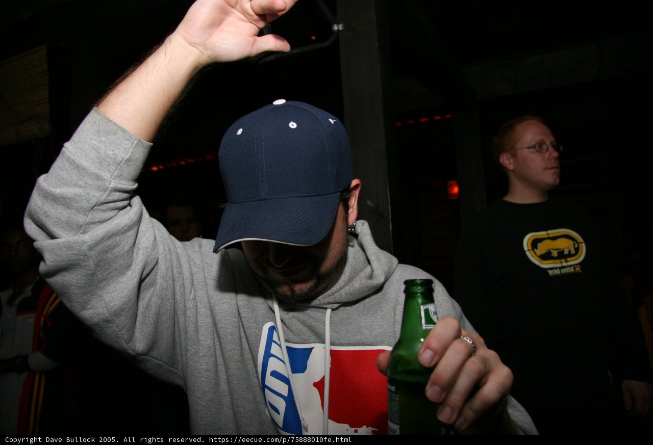 Grey Hoodie and Beer Bottles