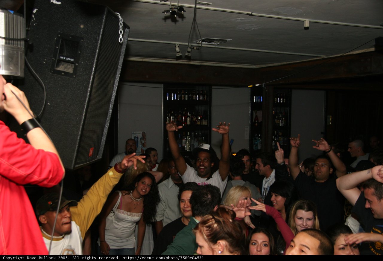Red Shirted Man in Urban Nightlife