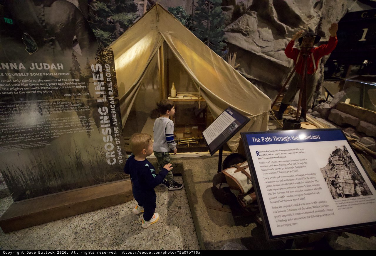 Children Exploring Historical Mountain Crossing Tent Exhibit