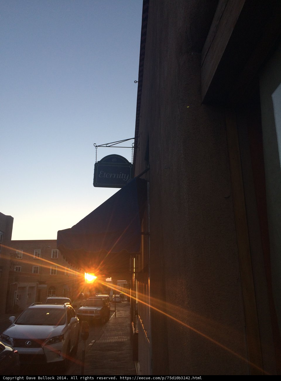 Sunset Reflections on a City Street