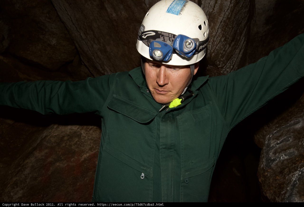 Worker with Hardhat and Flashlight