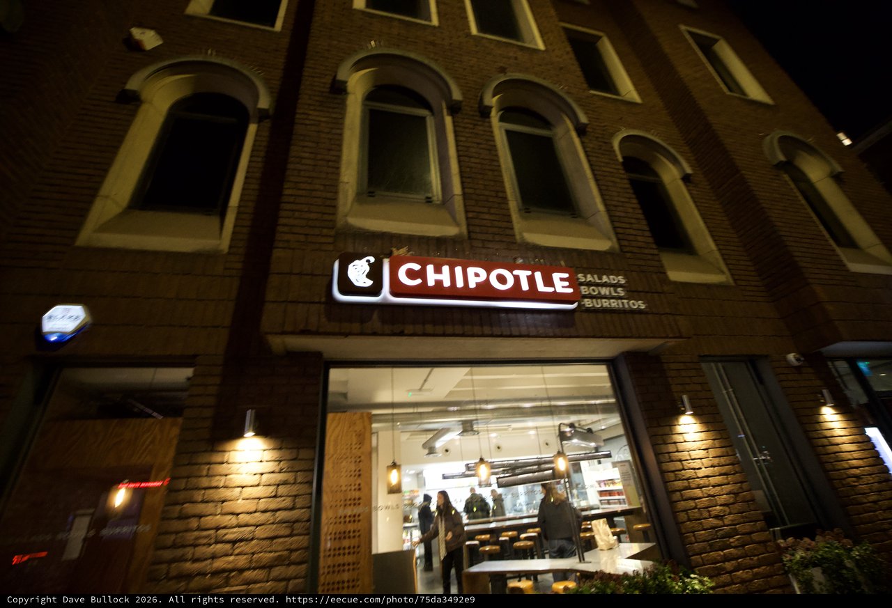 Chipotle Restaurant Storefront at Night in London